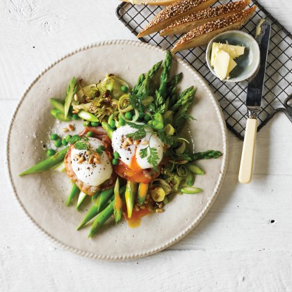 Eggspert Eggs on Sauteed Greens with Pancetta and Pine Nuts