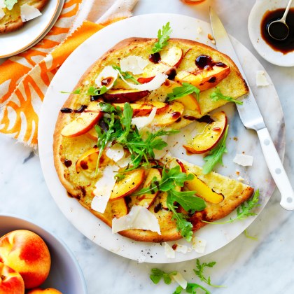Yellow nectarine, artichoke and rocket pizza