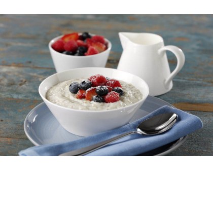 Creamy Porridge With Strawberries, Blueberries And Raspberries