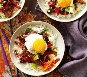 Korean BBQ beef bowl with kimchi and fried egg