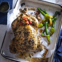 Herb Rub with Onion and Cherry Tomato Stuffing Roast Chicken