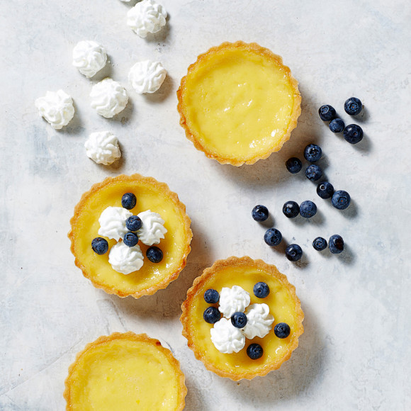 Classic Lemon Tarts with Meringue Buds and Blueberries