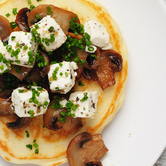 Healthy savoury pancake recipe topped with garlic mushrooms and fetta