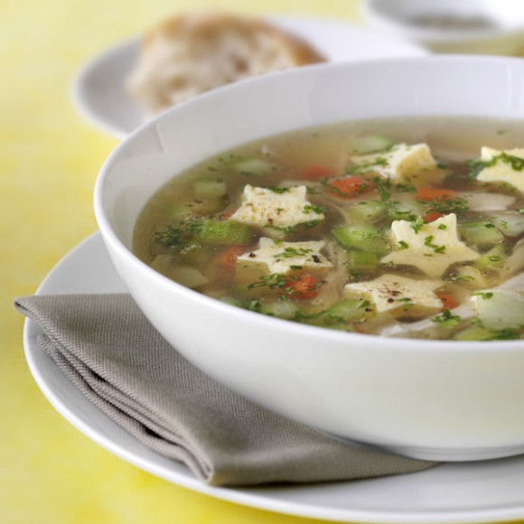 Chicken and vegetable soup with herb egg custard