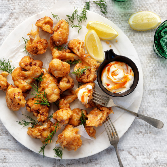These Gluten Free Spicy Fried Cauliflower Bites make the ultimate vegan appetiser with sweet chilli and vegan mayonnaise dipping sauce