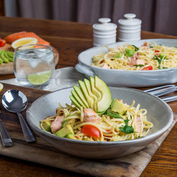 This is a photo of trout and avocado pasta