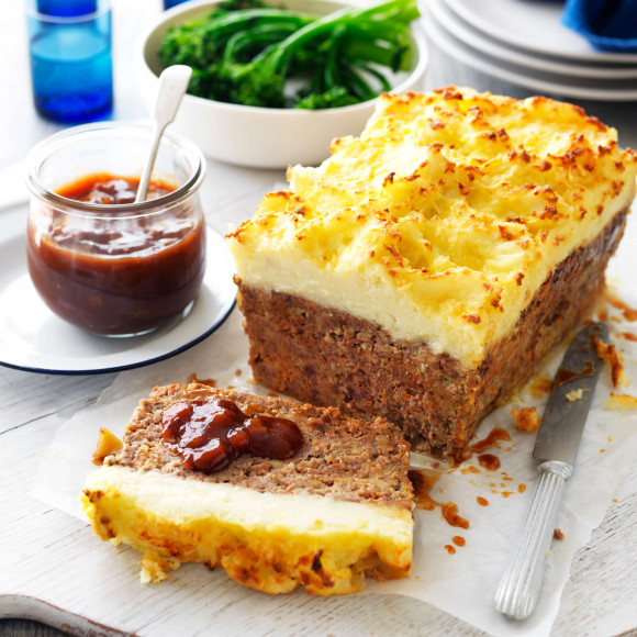 Meatloaf with mashed potatoes and cheese on top